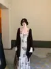 Vestido largo elegante vintage francés morado floral estilo Hong Kong impresionante nuevo vestido de malla estampada otoño 2026