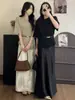 Traje de punto con manga murciélago y ajuste en la cintura + Falda de satén para mujer, Estilo de verano 2026, Moda de alta gama para verano
