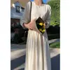 Vestido chic estilo coreano gola redonda manga longa feminino 2026 outono inicial novo saia longa de temperamento francês 18830