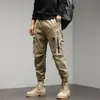 Monos transfronterizos para hombre, primavera y otoño, nueva moda coreana, leggings Harlan para hombre, pantalones holgados con múltiples bolsillos y puntera.