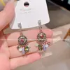 Pendientes de Disco de Cristal Brillante Estilo Retro de Lujo Ligero Nicho Únicos Populares Elegantes Versátiles Pendientes para Mujer