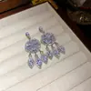 Pendientes de Borla de Diamante Redondo Aguja de Plata Pendientes Exagerados de Alta Gama de Lujo Ligero Pendientes de Diseño de Nicho Transfronterizos para Mujeres Venta al por Mayor