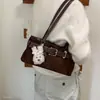 Bolso de Hombro Colgante Vintage Aspecto Gamuza Portátil para Viajes Diarios 2026 Bolso de Conejo de Moda Nuevo para Mujer Debajo del Brazo Otoño