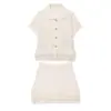 Ropa de Mujer Europea y Americana 2025 Nueva Tejido de Punto con Flecos Decorados a Cuadros Huecos Verano + Falda con Flecos Decorados 4331023