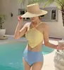 Traje de baño nuevo 2025 de Corea del Sur para mujer, bikini dividido triangular de cintura alta, color contrastante, hermoso, sexy, estilo pura lujuria, aguas termales