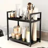 Estante de almacenamiento de escritorio de doble capa de venta caliente transfronterizo Estante de almacenamiento multifuncional perforado sin estante Estante para perfume y cosméticos