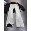 Jeans acampanados de corte oblicuo azul estilo high street americano para hombre, tendencia de verano versátiles lavados semi-elásticos rectos