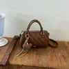 Moda Otoñal 2026 Transfronteriza Versátil Bolso Boston Acolchado para el Trabajo de Mujer Bolso de Mano de Moda Bolso Cruzado