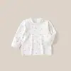 Camisa de otoño A-class de algodón puro sin costuras para niños, top ajustado de algodón para bebé para otoño e invierno, cárdigan de hombro para niños y niñas