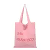 Bolsa de Lona com Estampa de Letras Nova Primavera Grande Capacidade Bolsa de Ombro Feminina Simples Fresca Versátil