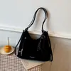 Otoño temprano 2026 nuevo vintage de alta gama moda versátil para mujer de gran capacidad doble hombro, un hombro, bandolera bolsa al por mayor bolsas de mujer