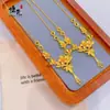 Tienda de Oro Mismo Estilo Arena Dorada Flor de Tres Vidas Collar con Borla Grande para Mujer Diseño de Moda Retro Cadena para Clavícula Joyería al por Mayor