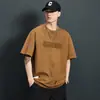 Camiseta Casual Versátil Masculina de Algodão Puro, Manga Curta, Gola Redonda, Estampa de Letras, Tendência Verão 2026, Corte Solto