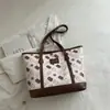 Bolso Tote de Hombro con Estampado Retro Texturizado para el Trabajo Moda Europea Americana Mujer 2026 Nuevo Elegante Bolso de Gran Capacidad
