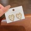 Pendientes coreanos nuevos de plata 925 con forma de aguja, con forma de amor hueco, para mujer, estilo moderno, con forma de hada, elegantes y perlados.