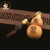 Nuevo llavero de calabaza hueca de madera de durazno del zodíaco de doce constelaciones colgante de calabaza de ocho direcciones para el dinero calabaza de madera de llenado de cinabrio
