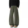 Pantalones cargo negros de pierna ancha con cordón para hombre, cintura elástica, corte holgado, corte tridimensional, con caída, hasta el suelo, sencillos y adecuados para ir al trabajo.