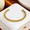 Fornecimento exclusivo transfronteiriço de pulseiras de aço titânio abertas em formato C prensadas a óleo para homens e mulheres, joias da moda 18K que não desbotam atacado