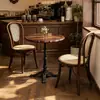 Mesa redonda de café tallada Juego de mesa y silla para restaurante occidental Mesa de madera maciza para pastelería Mesa y sillas de comedor para bar americano