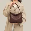 Bolsa Feminina 2026 Novo Estilo Bolsa Feminina Outono/Inverno Couro Genuíno Bolsa Tote de Ombro Único Versátil para o Trabalho Bolsa Transversal