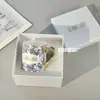 Plato de hueso europeo de lujo ligero transfronterizo para filete estilo occidental decoración Mesa de sala modelo plato plano de hueso de china casero de hortensias