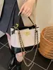 Bolso tote de cadena con patrón de rombos estilo Chanel pequeño para mujer 2026 nuevo bolso de mano de alta gama bolso de hombro único cruzado