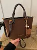 Bolso tote pequeño para mujer para el trabajo, nuevo bolso de hombro retro para ir al trabajo Otoño 2026, bolso cruzado tipo cubo versátil