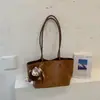 2026 bolsa de ombro tote casual simples de cor sólida estilo coreano retrô casual de grande capacidade para trabalho e deslocamento