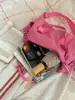 Bolso de nailon multicolor macarrón multifuncional nuevo transfronterizo 2026, ligero, moderno, versátil y se puede llevar como bolso de hombro, bolso cruzado o bolso de mano.
