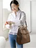 Mochila de tela Oxford para mujer, nuevo modelo 2026, impermeable, casual, de viaje, para ir al trabajo, doble uso, mochila para mujer, bolsa de viaje de gran capacidad