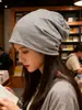 Bufanda de moda para celebridades de internet sombrero holgado estilo fino para otoño e invierno sombrero a prueba de viento posparto para mujer sombrero de punto holgado versátil para mujer