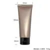 Mancha 100ml100g manguera marrón esmerilada limpiador facial limpiador facial tapa abatible oscura botella vacía logo