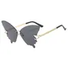 Gafas de sol mariposa medio metal sin montura color caramelo degradado pieza oceánica moda retro tendencia europea y americana gafas de sol al por mayor