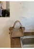 Bolsa Cesta de Legumes Exquisita e Compacta para Mulheres Nova Coleção Primavera 2026 Bolsa de Ombro Transversal em Couro Macio Bolsa de Mão para o Dia a Dia Bolsa Saco