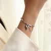 Collar Marka con borla de amor, cadena para la clavícula, estilo ins viento frío, transfronterizo, acero de titanio, no se decolora, traje de joyería al por mayor