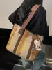 Bolsa Feminina de Comércio Exterior 2025 Nova Moda Bolsa de Lona Listrada Grande Capacidade Bolsa de Ombro Portátil para o Dia a Dia Bolsa Tote Transversal