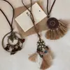 Collar Bohemio Marrón Vintage con Borlas, Estilo Étnico Hippie, Nicho 2026 Nueva Cadena para Suéter con Colgante de Mariposa