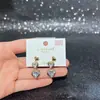 Pendientes de Corazón Diseñados para Otoño e Invierno para Mujer Aguja de Plata S925 Moda Exquisita de Nicho Versátiles Pendientes Galvanizados Ecológicos