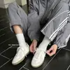 Zapatillas de entrenamiento vintage alemanas súper suaves de piel de vaca para mujer, nuevas zapatillas casual versátiles con cordones 2026 con aumento interno de altura