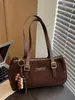 Bolso Retro de Gama Alta Coreano para Mujer 2025 Nueva Moda Bolso Versátil de Axila para el Trabajo y los Viajes Bolso Hombro Baguette