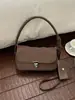 Bolso de axila popular de nicho minimalista coreano Dongdaemun, bolso de diseño de nicho popular transfronterizo primavera-verano, bolso de mujer para el trabajo