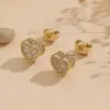 Pendientes de botón de corazón de diamantes completos de lujo ligero de venta caliente transfronterizos, pendientes de circonita exquisitos de nicho, pendientes versátiles de alta gama para mujer