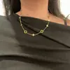 Collar con Diamantes de Color Trébol de Cuatro Hojas de Lujo Ligero de Nicho para Mujer Cadena de Clavícula Nueva de Alta Gama 2025