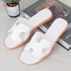2022 chanclas mujer verano planas moda chanclas comercio electrónico transfronterizo venta caliente trenzado diamante con sandalias de color liso