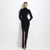 Roupas femininas transfronteiriças europeias e americanas outono 2026 novo macacão de cor sólida com gola alta e saia plissada com fenda terno casual para mulheres