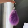 Llavero de coche de piel de zorro, colgante para bolso de piel auténtica, adorno colgante de peluche, decoración de cola linda, accesorio de llavero personalizado y elegante