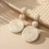 Venta al por mayor de joyería transfronteriza, Pendientes geométricos de rafia hechos a mano, Pendientes exagerados de estilo bohemio vacacional, Hecho a medida
