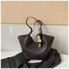 Bolso de hombro grande de moda coreana simple y elegante para mujer, capacidad grande, nuevo para Otoño 2026, para el trabajo diario.