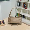 Bolso de axila de nicho transfronterizo para mujer, nueva moda otoño 2026, moderno, lujo ligero, alta gama, elegante bolso de mano y bolso de hombro
