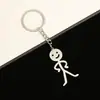 Chaveiro de chaveiro de casal com grafite de aço inoxidável exclusivo transfronteiriço pingente grande stickman